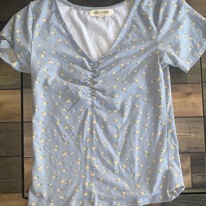 light blue v neck shirt with flowers size medium